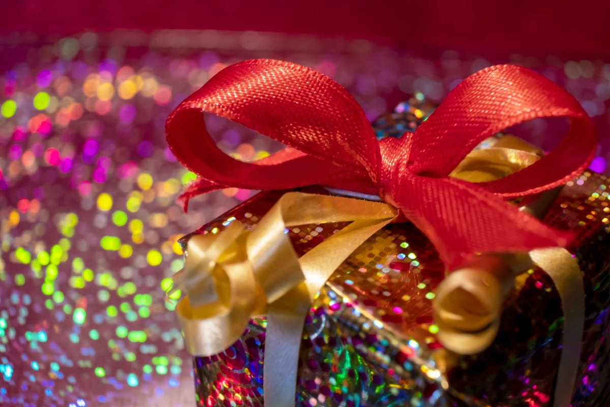 A wrapped gift exchange present with a playful bow